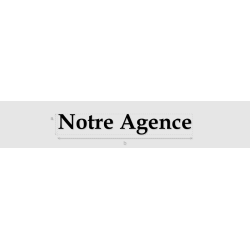 Découpe de lettres : "Notre...