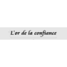 Découpe de lettres : "L'or de la confiance"